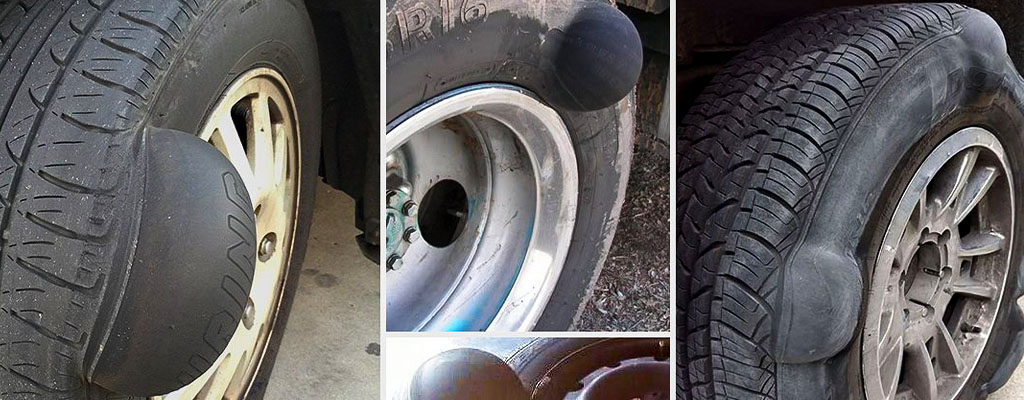 Na fotografiji so avto gume, na katerih so se pojavile izbokline.